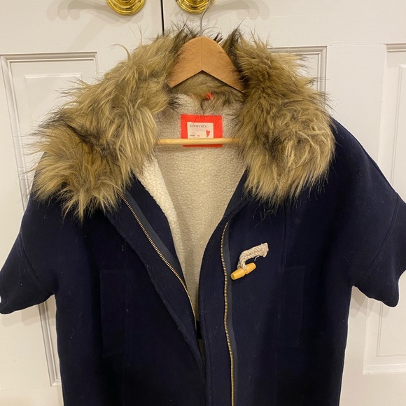 Elbow length sleeve, fur lined neck cape like coat